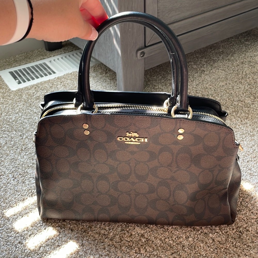 Dark brown and black coach purse